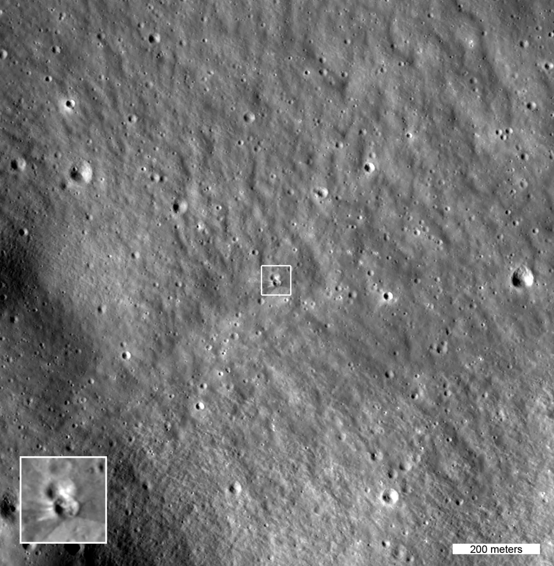The box in the center of the image highlights two small craters; the lower crater formed on August 5th when a SpaceX Falcon 9 upper stage, impacted the Moon.