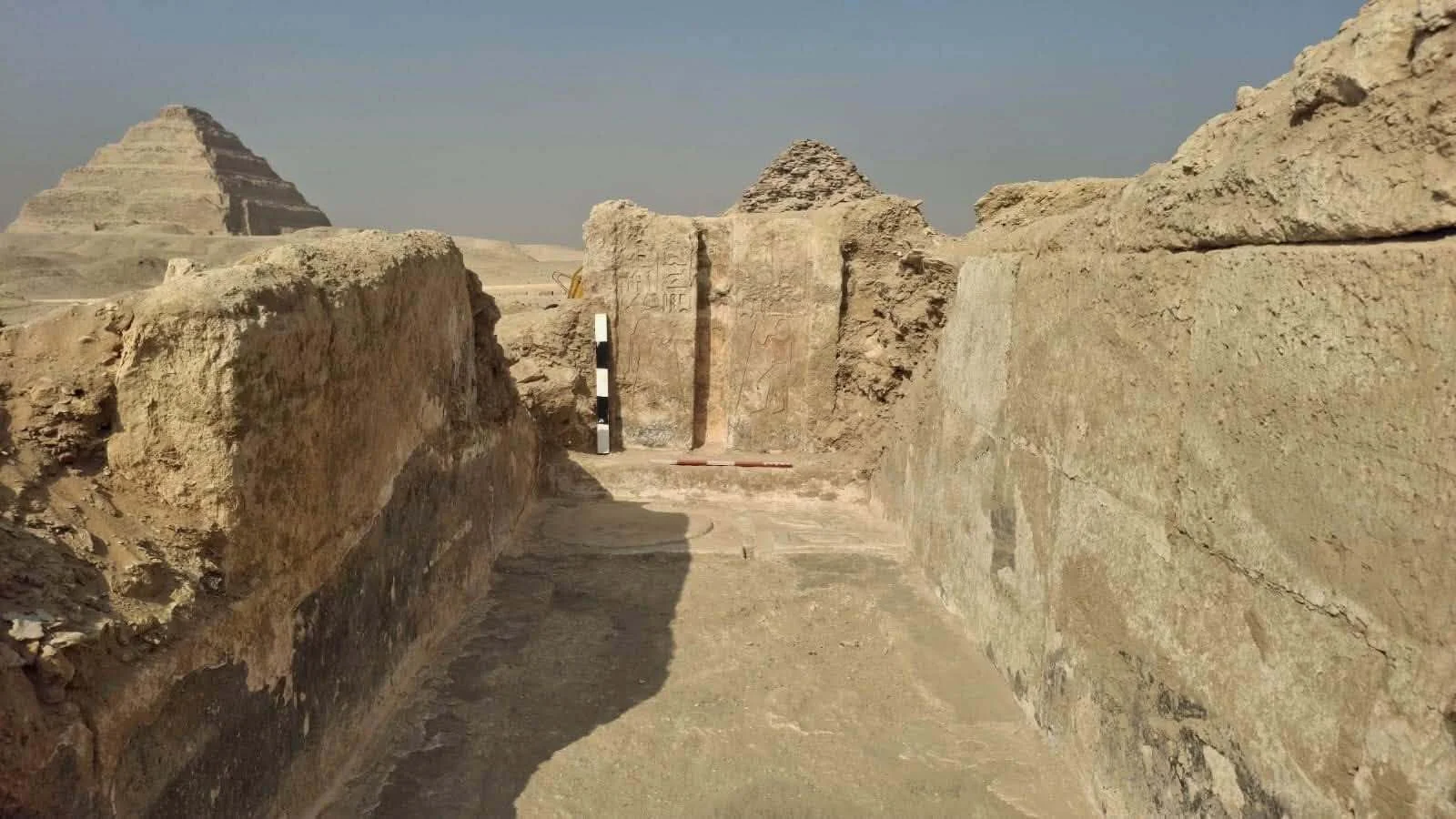 A view of part of a tomb in the desert.